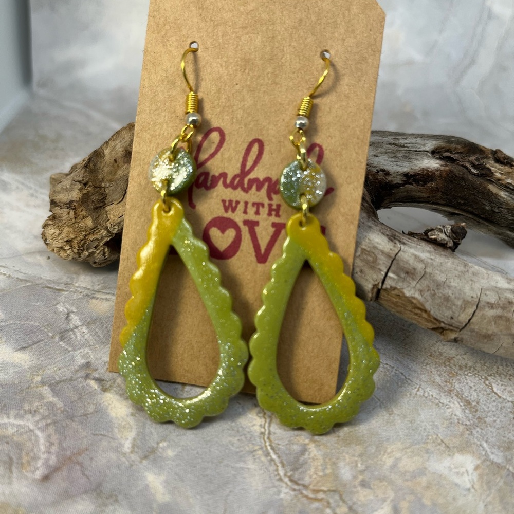 Green, yellow earrings.